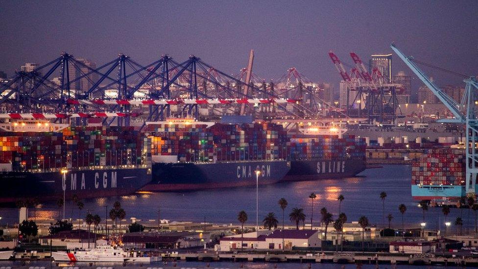 Ships being unloaded and waiting to be unloaded at LA port