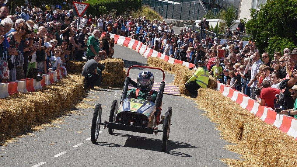 Push-cart going down the street