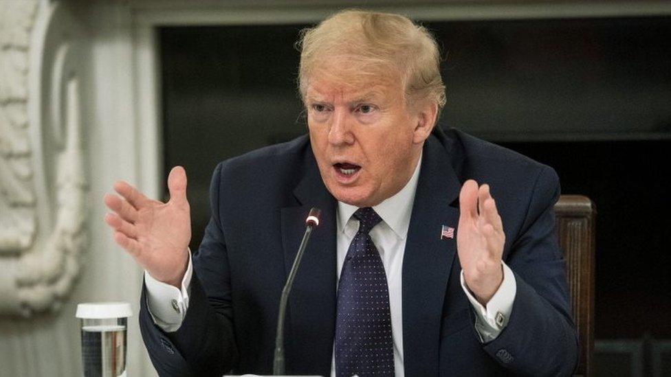 President Donald Trump speaks during a roundtable in the State Dining Room of the White House May 18