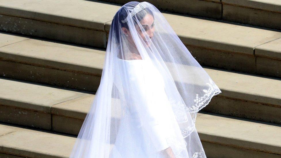 Meghan Markle arrives for the wedding ceremony to marry Prince Harry at St George's Chapel, Windsor Castle