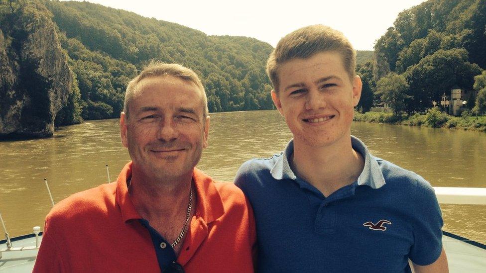 A younger Harry Cleary (right) with his father Graham (left) in a boat on a river