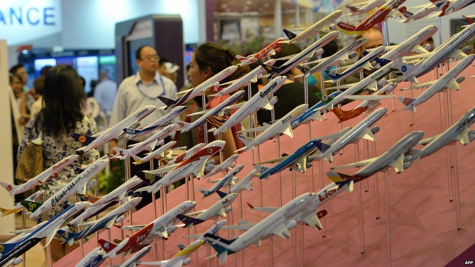 Miniature display of various commercial airlines are exhibited during the Singapore Airshow