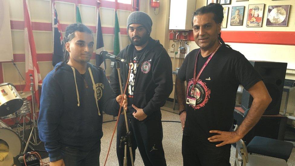 Apache Indian with his music academy students