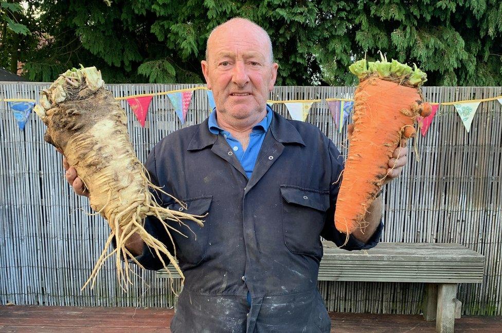 Joe Atherton with his giant vegetables