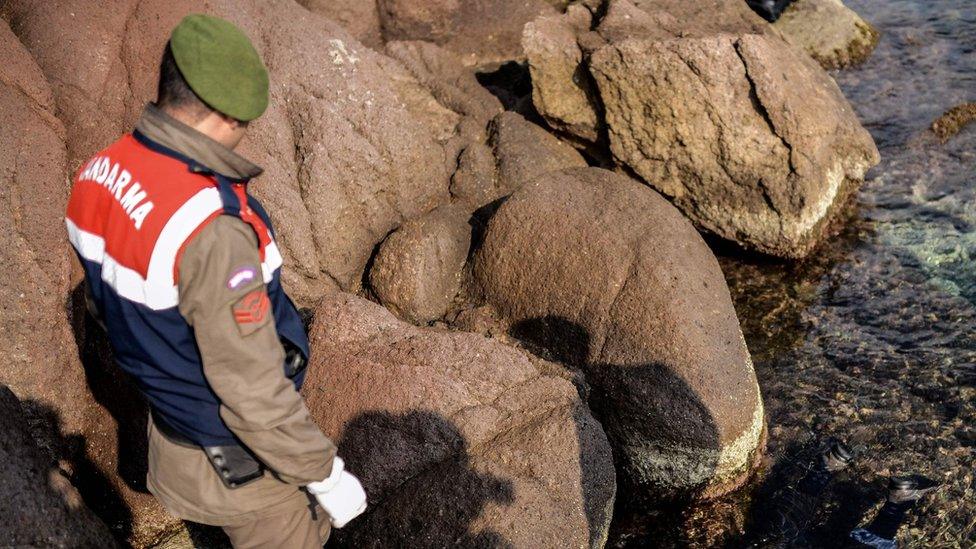 Turkish gendarme near the site of a migrant boat capsize (30 January)