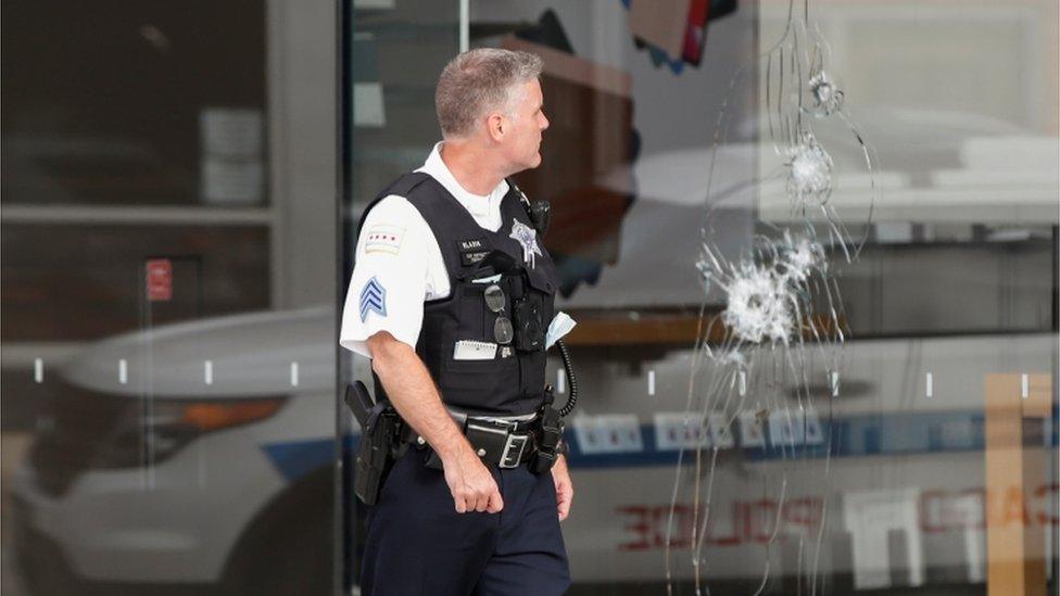 Officer inspects Apple Store