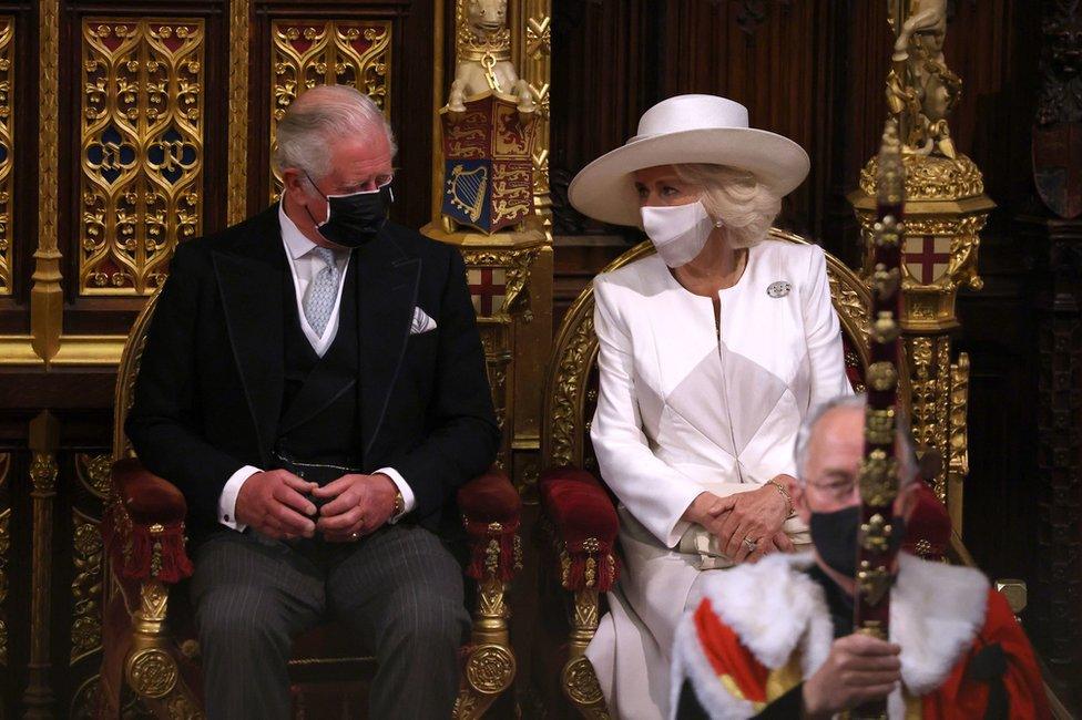 The Prince of Wales and the Duchess of Cornwall seen as Queen Elizabeth II delivers a speech from the throne in House of Lords at the Palace of Westminster in Londo