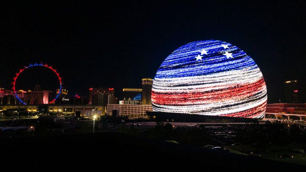 Sphere lit up with US flag design.