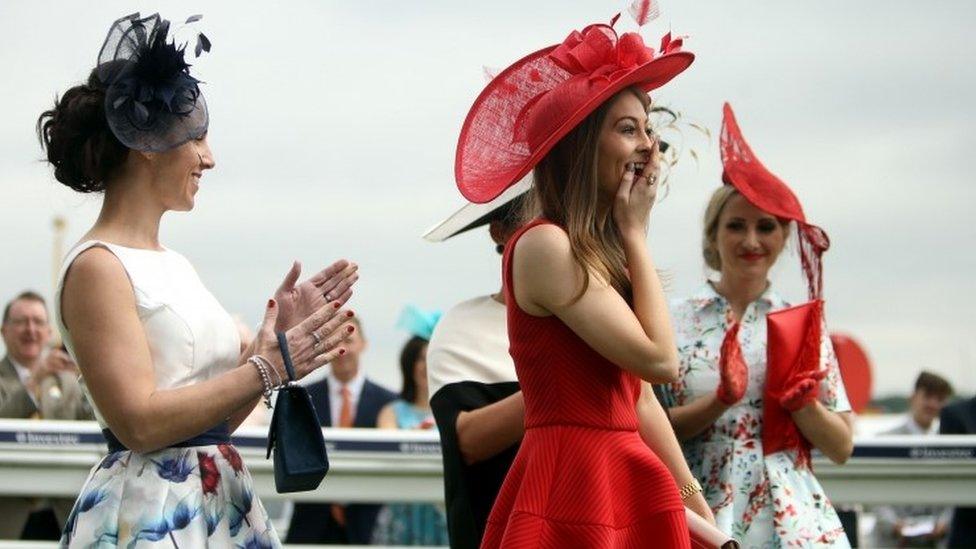 Katherine Wheatley from Surrey (second right) wins the Investec Ladies Style Award on Ladies Day during the 2016 Investec Epsom Derby Festival