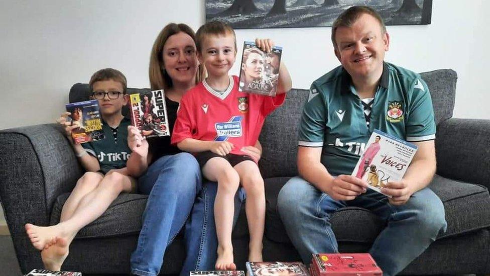 Rob Clarke and his family with the DVD's