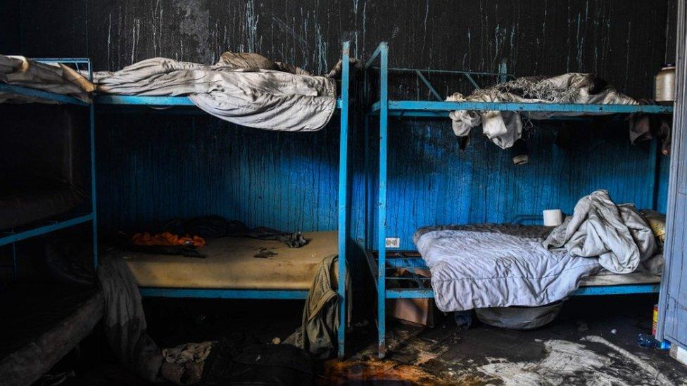 Burned remains are seen in a room inside the Orphanage of the Church of Bible Understanding where a fire broke out the previous night in the Kenscoff area outside of Port-au-Prince, 14 February, 2020.