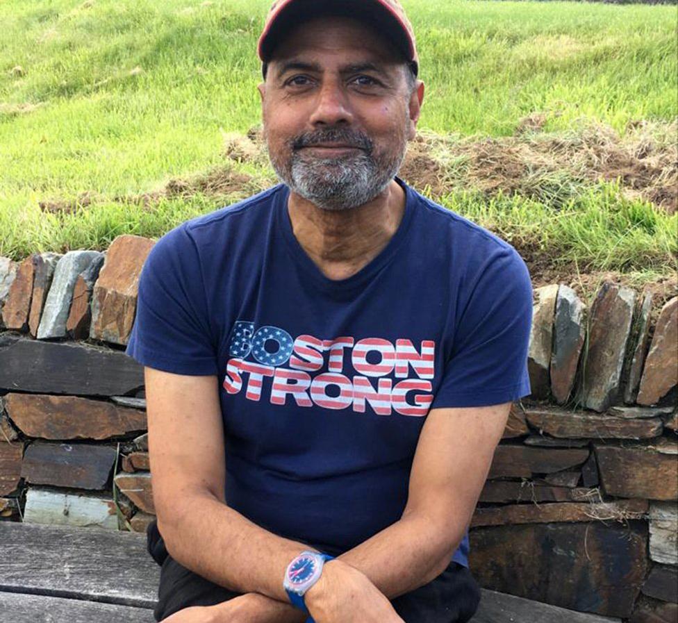 George Alagiah wearing Sophie Raworth's Boston marathon T-shirt