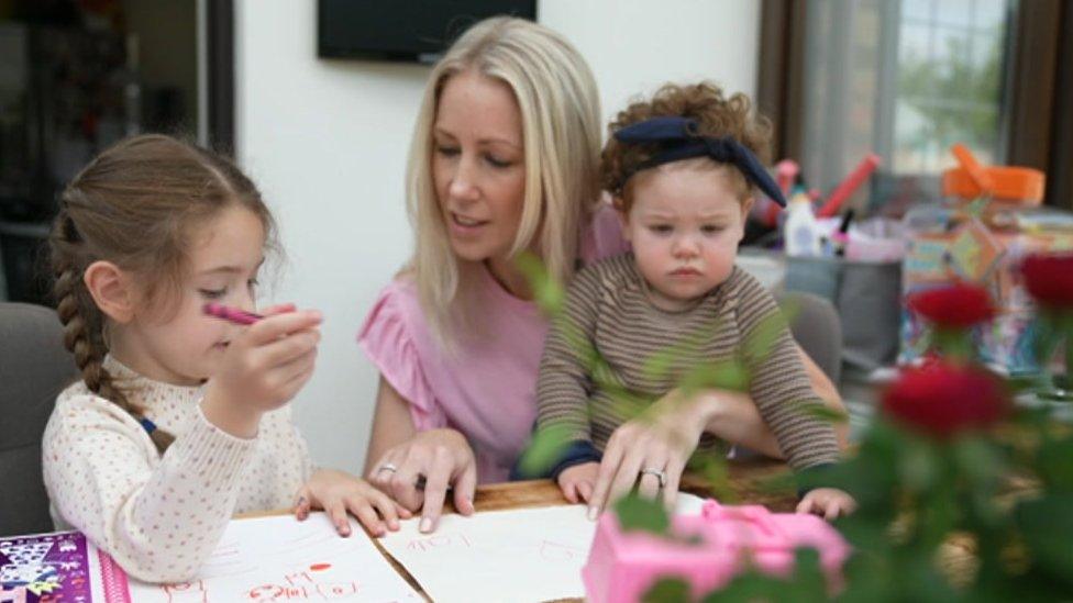 Isabel Farmer with her two daughters