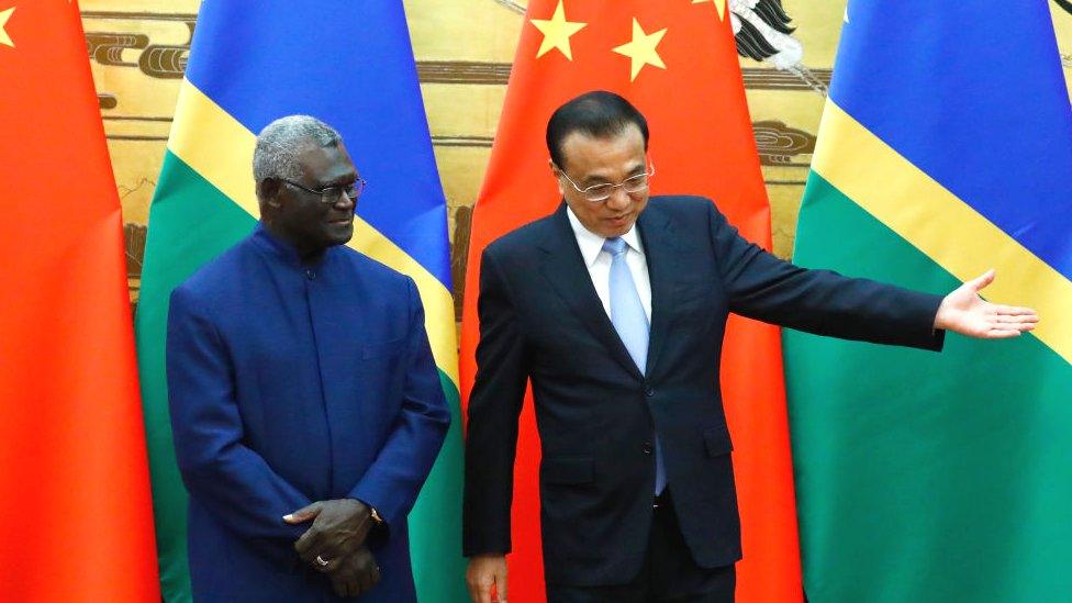 Solomon Islands Prime Minister Manasseh Sogavare attends a meeting with Chinese Premier Li Keqiang