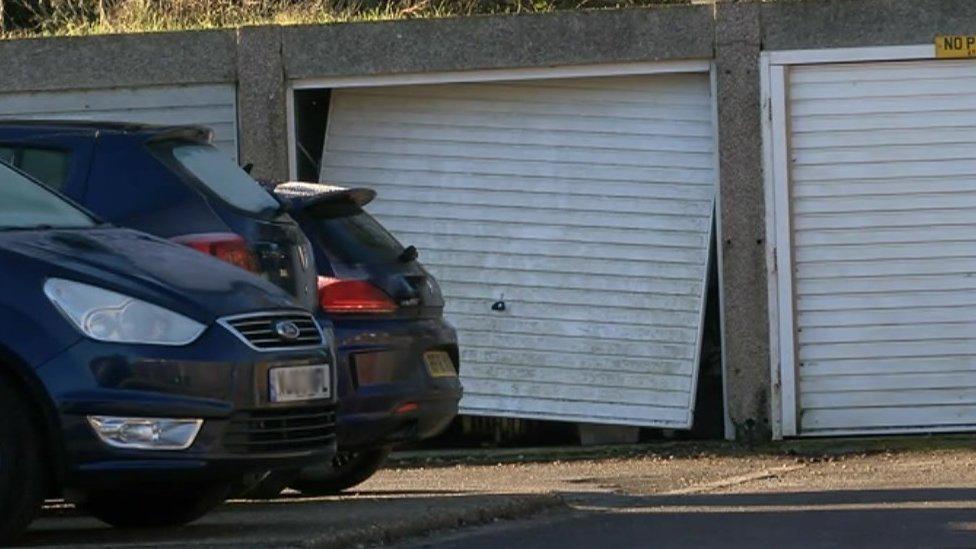The shooting took place at a block of garages