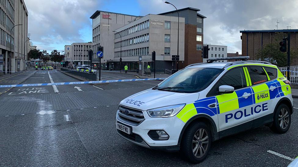 Police car blocking road