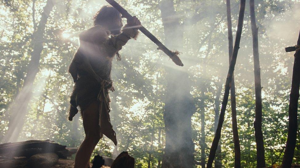 Animation graphic of Neanderthal with a spear