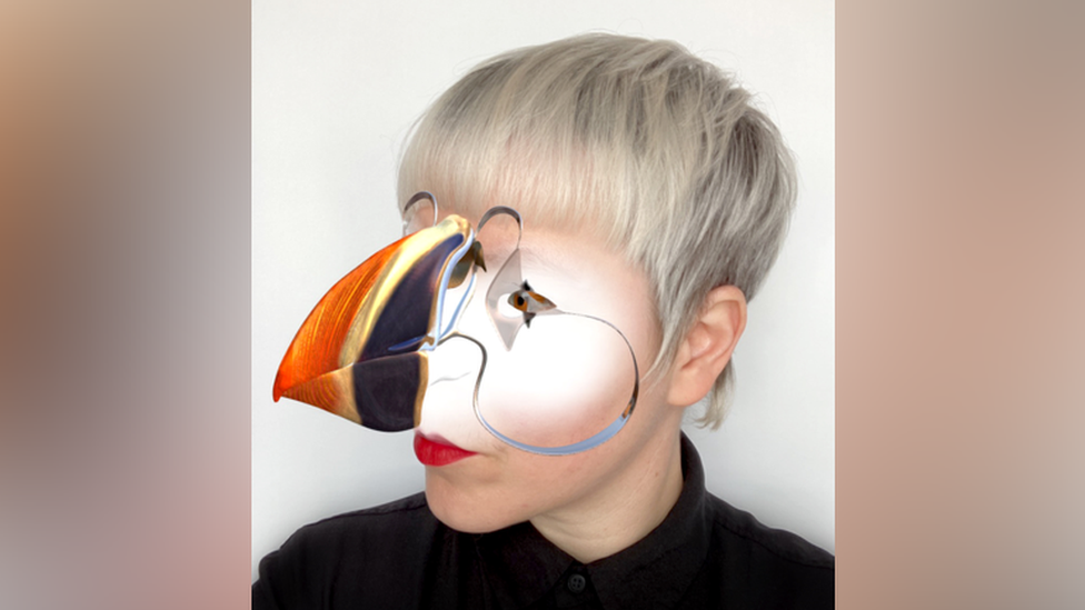 Woman using bird filter