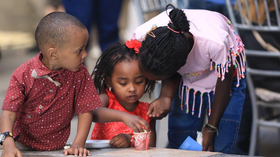 Sudanese and Somalian children celebrate during an activity marking World Refugee Day in Khan As"ad Pasha, in the old city of Damascus, Syria, 20 June 2018.