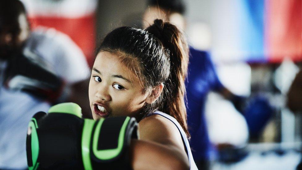 a young girl boxer