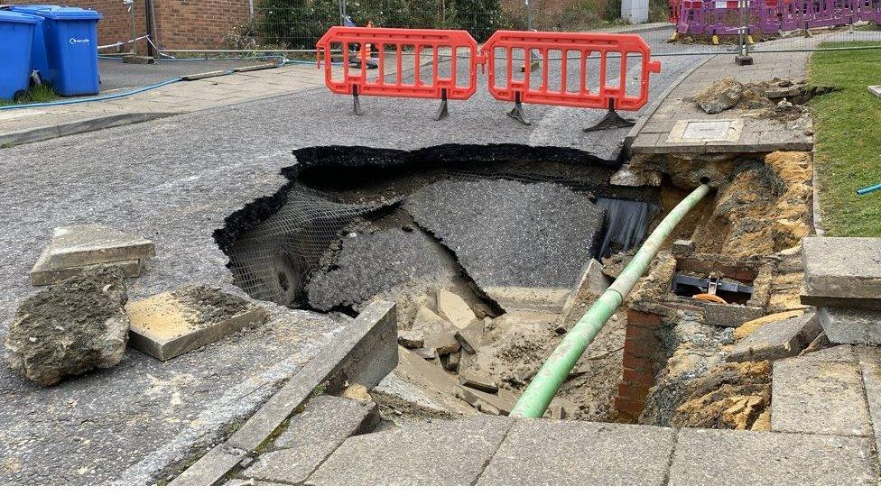 Sinkhole in residential street in Norwich