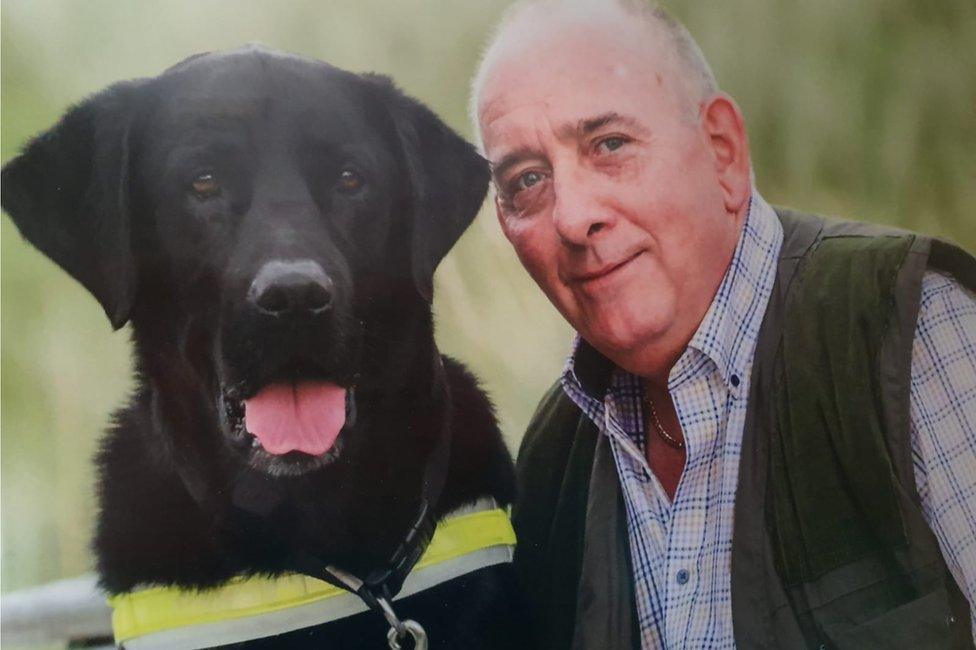 Laurence McDermott and his guide dog Scamp