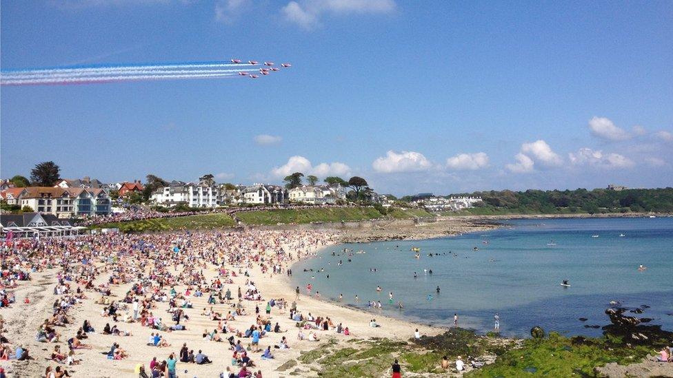 Red Arrows fly over Gyllingvase Beach, Falmouth