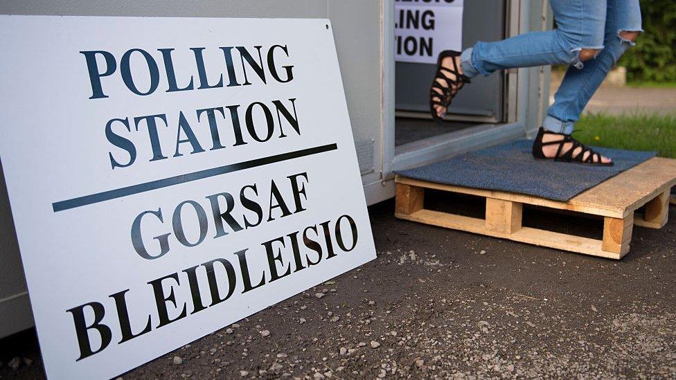 Polling station sign in English and Welsh