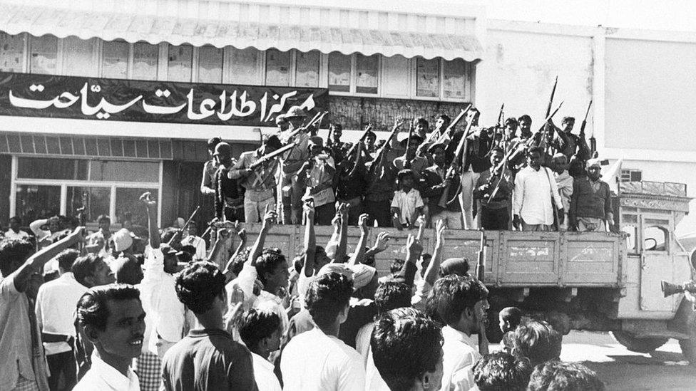 A crowd cheers a truckload of pro-independence Mukti Bahini guerrillas two days after the Pakistani surrender at the end of the Bangladesh War of Independence, 18th December 1971.