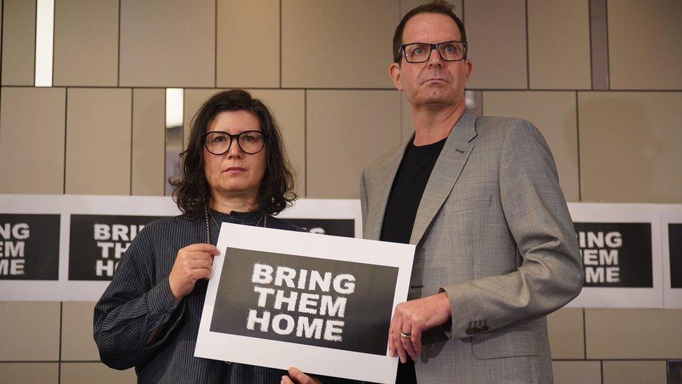 Sharone Lifschitz and Noam Sagi, two London-based British Israelis whose parents are among the hostages held by Hamas in Gaza, speaking at a Defend Israeli Democracy UK press conference at Plaza Westminster Bridge Hotel in London.