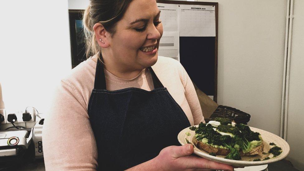 Image of May Colquhoun holding one of the dishes made in Eat Me