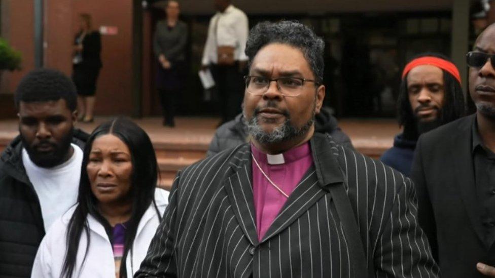 Bishop Desmond Jaddoo outside Birmingham Crown Court