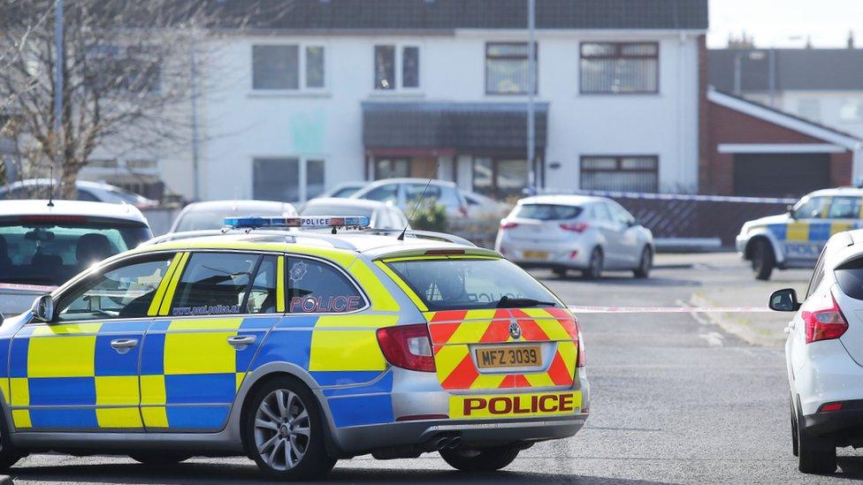 A police car at the scene of the shooting