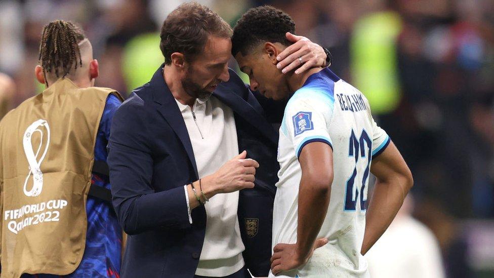 England Manager Gareth Southgate consoles 19-year-old Jude Bellingham after England lose