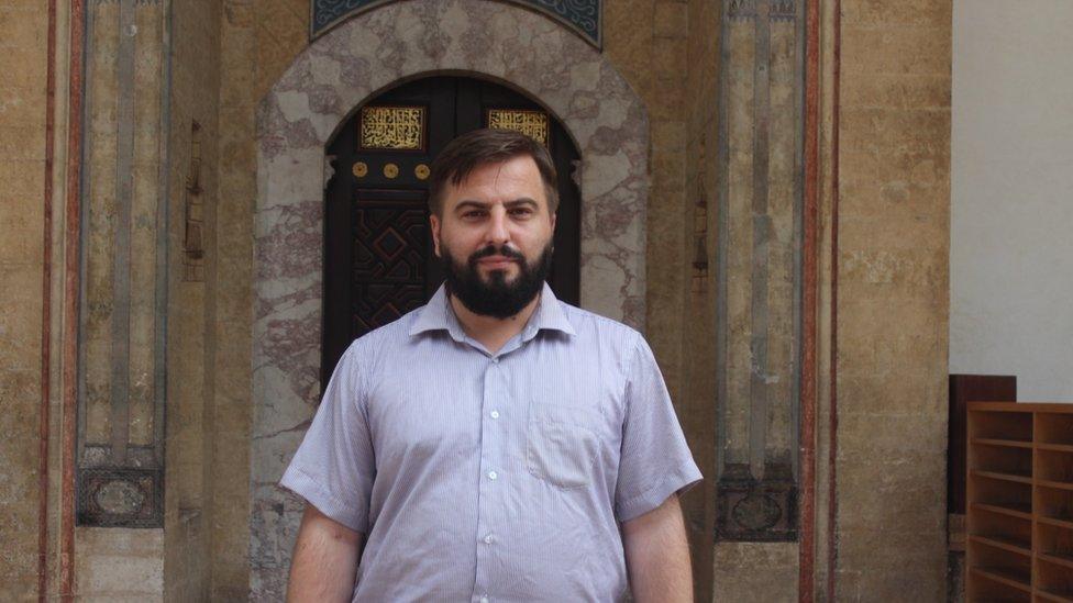 Adnan Ducic in front of the 16th century Gazi Husrev-bey Mosque in Sarajevo