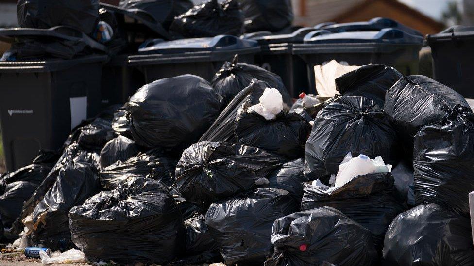 Household rubbish begins to pile high on the streets of Alum Rock in Birmingham in August 2017