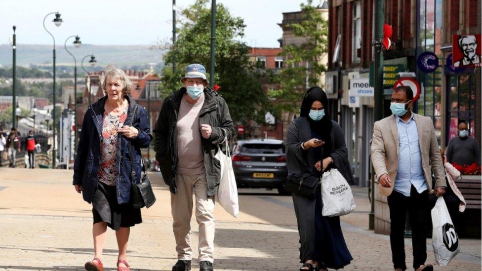 Masked shoppers Oldham