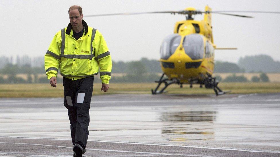 Prince William walks away from his helicopter