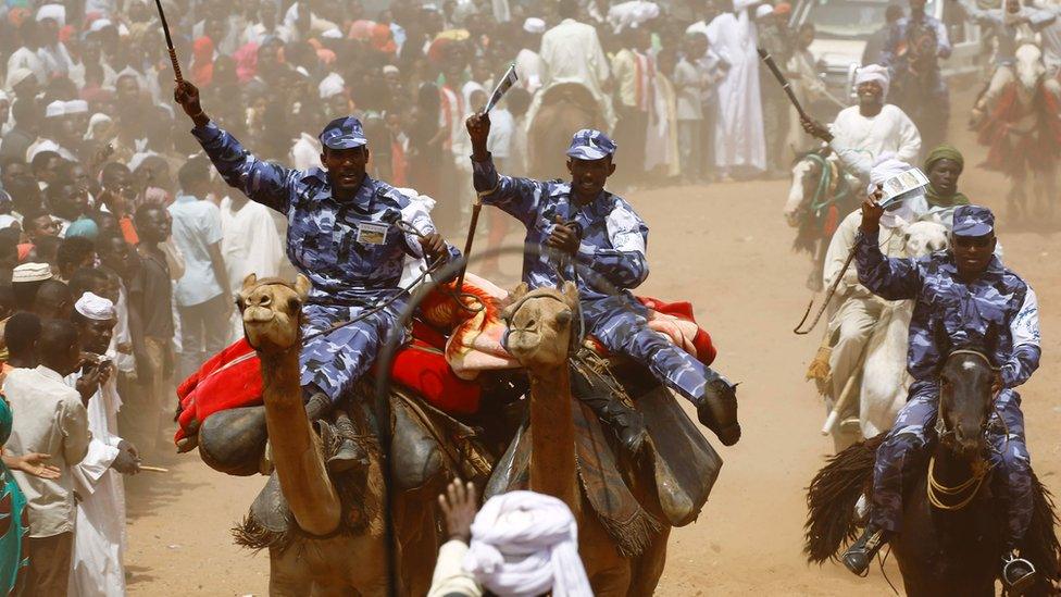 Security forces on camels and horses at a rally in Geneina, Darfur, Sudan - Saturday 2 April 2016