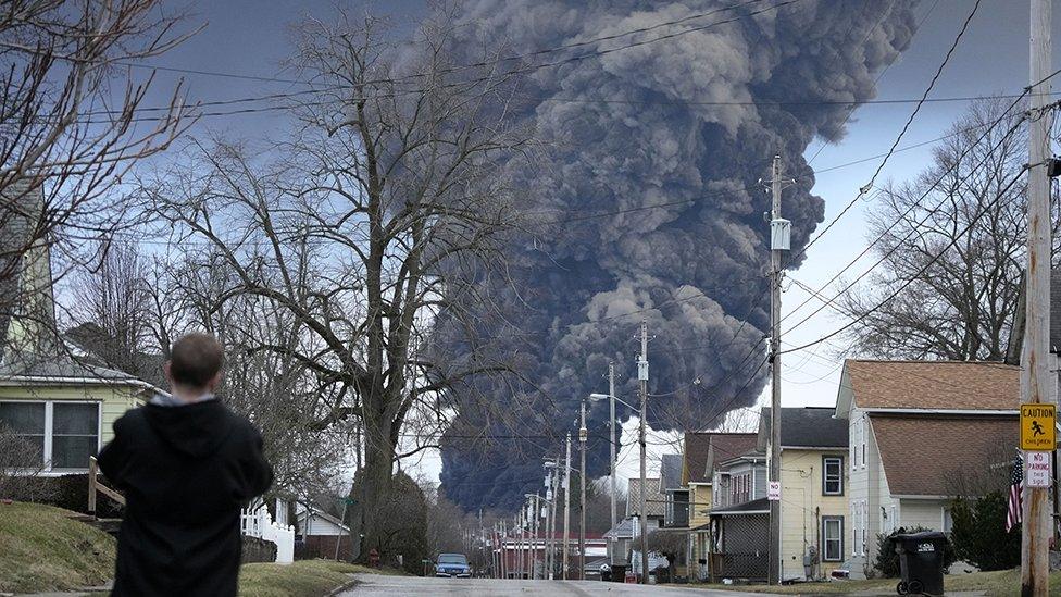 A smoke cloud rises above East Palestine after the train derailment