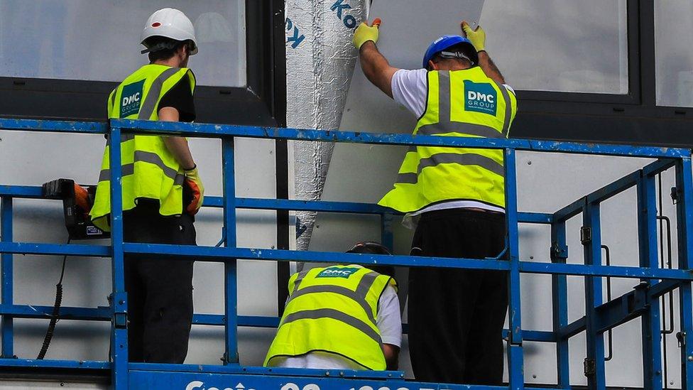 Cladding components being removed from Whitebeam Court in Manchester