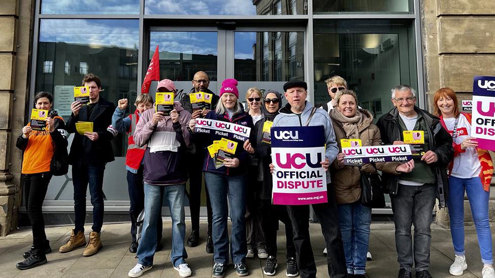 Pickets outside college