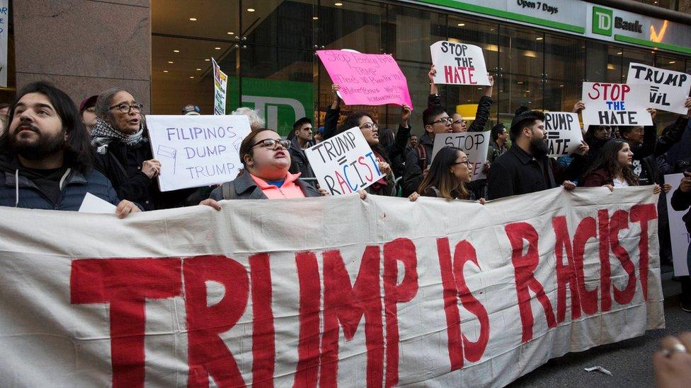 Protesters demonstrate against Republican U.S. presidential candidate Donald Trump in midtown Manhattan