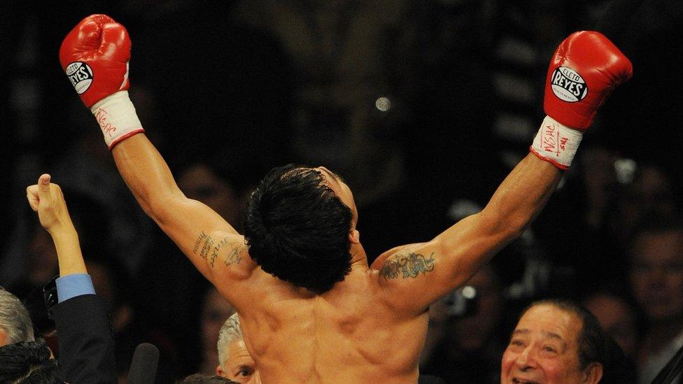 Manny Pacquiao of the Philippines celebrates after knocking out Ricky Hatton of England to win their Welterweight title fight at the MGM Grand Garden Arena on 2 May 2009 in Las Vegas