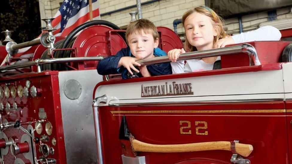 Children in a fire engine