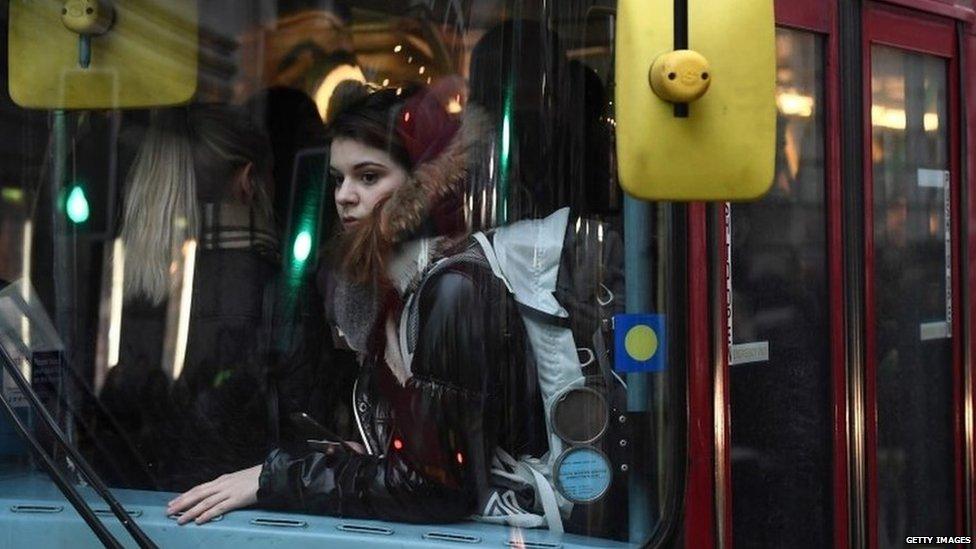 Passenger on a bus in London