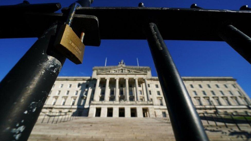 A lock on a gate outside Parliament Buildings at Stormont