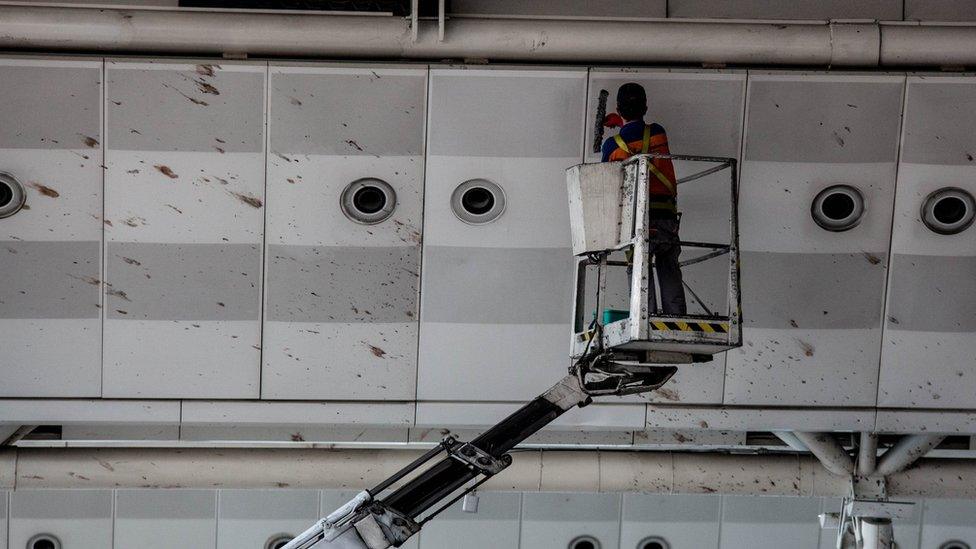 Blood on the roof of the international departure terminal