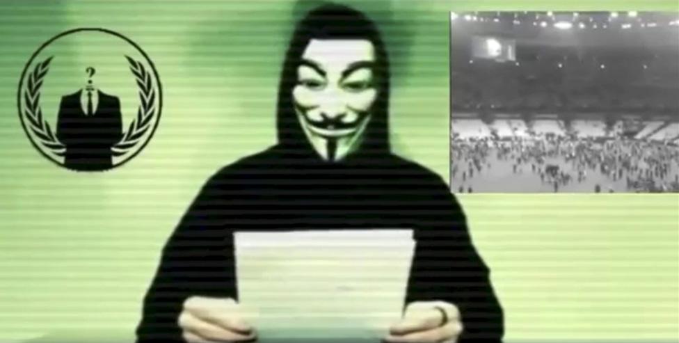 A man wearing a mask associated with Anonymous makes a statement in this still image from a video released on November 16, 2015