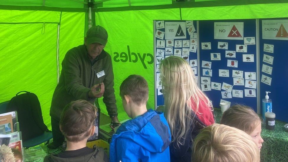 Children learning about compost at Suffolk Recycling